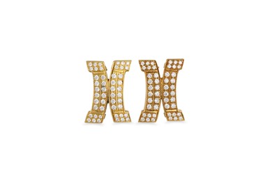 Lot 33 - A PAIR OF DIAMOND CLUSTER EARRINGS, of shaped...