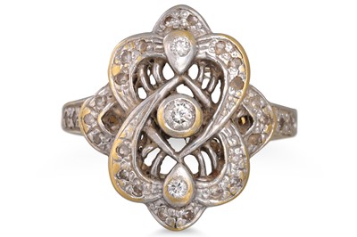 Lot 44 - A SHAPED DIAMOND CLUSTER RING, mounted in 18ct...