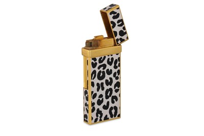 Lot 40 - AN YVES SAINT LAURENT ENAMEL LIGHTER, black &...