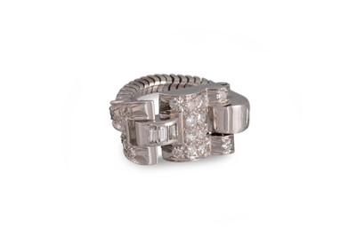 Lot 429 - AN UNUSUAL ART DECO FLEXIBLE DIAMOND RING, set...