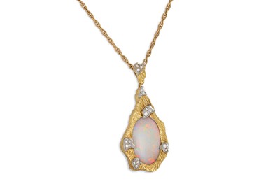 Lot 440 - A VINTAGE OPAL AND DIAMOND PENDANT, the oval...