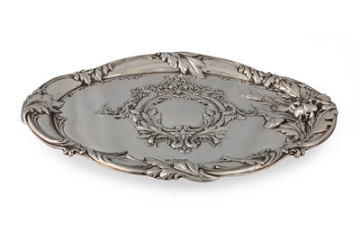 Lot 543 - AN EDWARDIAN SILVER TRINKET TRAY, of embossed...