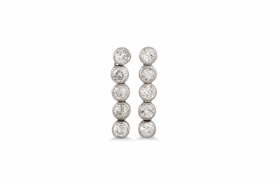 Lot 446 - A PAIR OF DIAMOND DROP EARRINGS, comprising...
