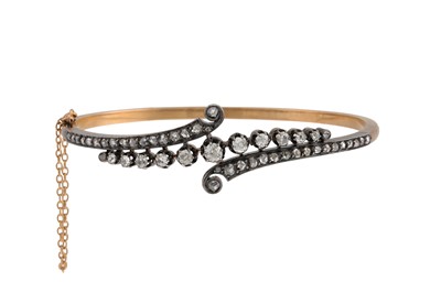 Lot 181 - AN ANTIQUE DIAMOND SET BANGLE, comprising a...