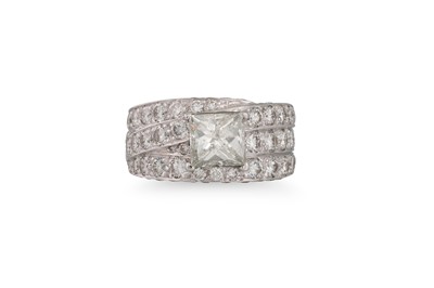 Lot 266 - A DIAMOND CLUSTER RING, the princess cut...