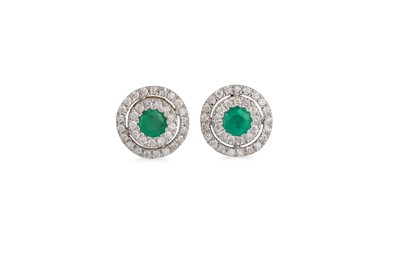 Lot 83 - A PAIR OF DIAMOND AND EMERALD CLUSTER EARRINGS,...
