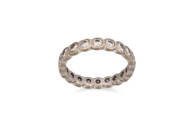 Lot 225 - A DIAMOND ETERNITY RING, the brilliant cut...
