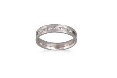 Lot 186 - A DIAMOND HALF ETERNITY RING, the princess cut...