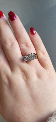 Lot 133 - A VINTAGE TWO ROWED DIAMOND RING, mounted in...