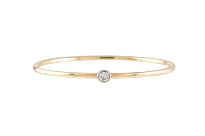 Lot 266 - A DIAMOND SET BANGLE, by Emma Stewart Liberty...