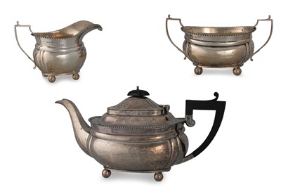 Lot 540 - A GEORGE V THREE PIECE SILVER TEA SERVICE,...