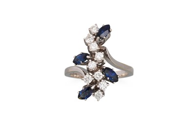 Lot 266 - A DIAMOND AND SAPPHIRE CLUSTER RING, of...