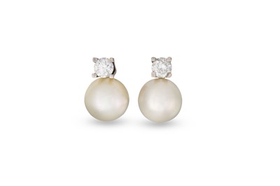 Lot 224 - A PAIR OF PEARL AND DIAMOND EARRINGS, mounted...