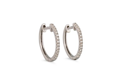 Lot 48 - A PAIR OF DIAMOND HOOP EARRINGS, mounted in...
