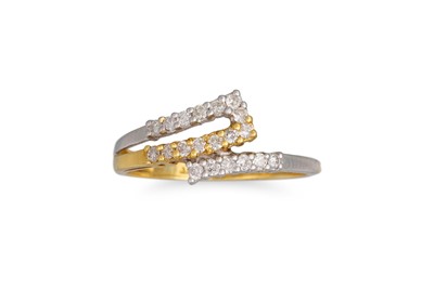 Lot 152 - A DIAMOND CROSS OVER RING, mounted in 18ct...