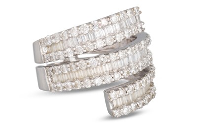 Lot 261 - A DIAMOND TRIPLE ROW DRESS RING, of cross over...