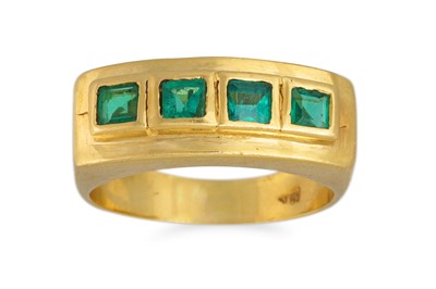 Lot 94 - AN EMERALD FOUR STONE RING, mounted in 18ct...