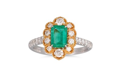 Lot 196 - AN EMERALD AND DIAMOND CLUSTER RING, the...