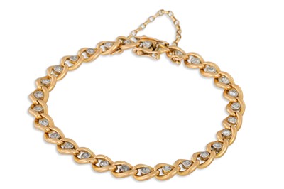 Lot 420 - A DIAMOND SET BRACELET, the curb links set...