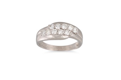 Lot 376 - A TWO ROWED DIAMOND RING, the brilliant cut...