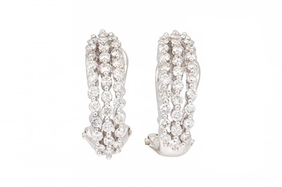 Lot 367 - A PAIR OF DIAMOND HOOP EARRINGS, the brilliant...
