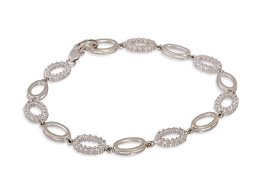 Lot 16 - A WHITE METAL STONE SET BRACELET, 6.7 g.