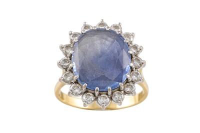 Lot 60 - A SAPPHIRE AND DIAMOND CLUSTER RING, the oval...
