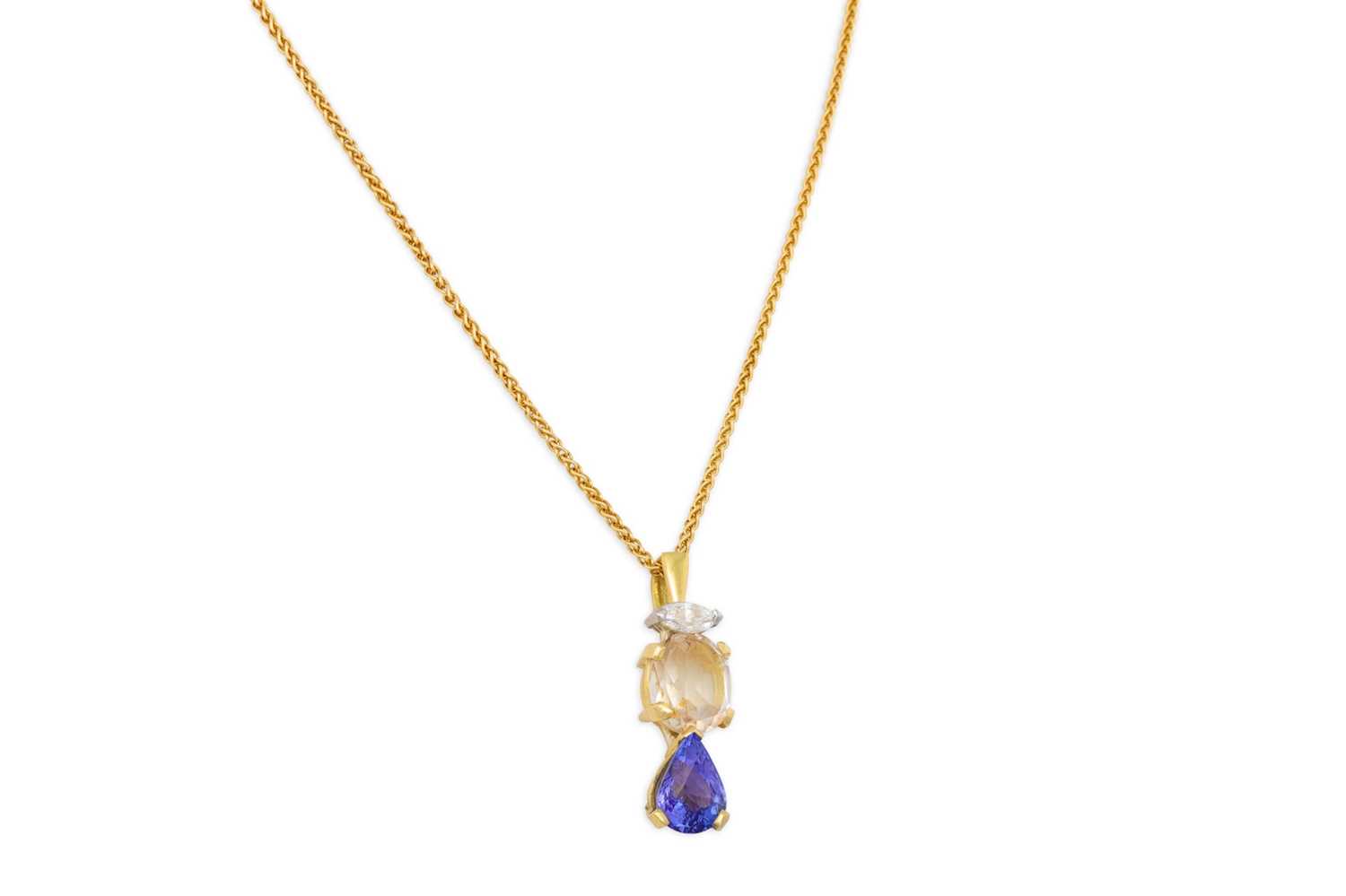 Lot 71 - A DIAMOND, CITRINE AND TANZANITE PENDANT,...