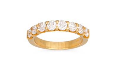 Lot 199 - A DIAMOND HALF ETERNITY RING, the brilliant...