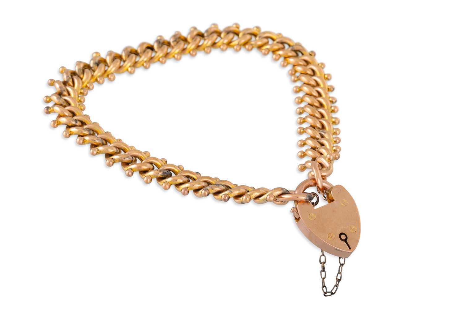 Lot 101 - AN ANTIQUE GOLD FANCY LINK BRACELET, with...