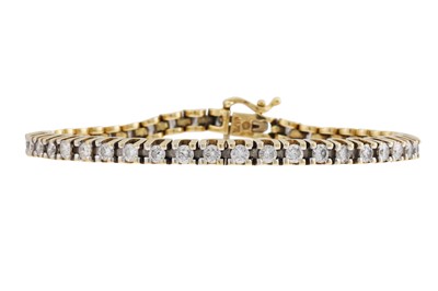 Lot 149 - A DIAMOND LINE BRACELET, the brilliant cut...