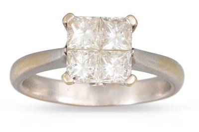 Lot 214 - A DIAMOND CLUSTER RING, the princess cut...