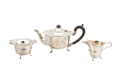 Lot 464 - A GEORGE V SILVER THREE-PIECE TEA SET,...