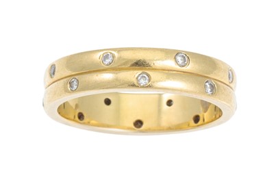 Lot 169 - AN 18CT YELLOW GOLD BAND RING, diamond set....