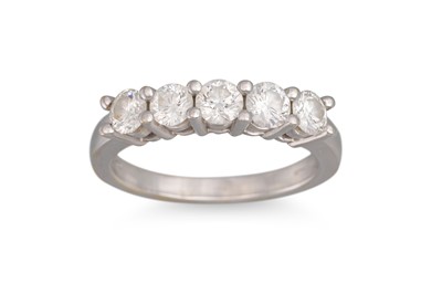 Lot 122 - A FIVE STONE DIAMOND RING, the brilliant cut...