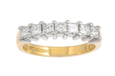 Lot 256 - A DIAMOND HALF ETERNITY RING, the princess cut...