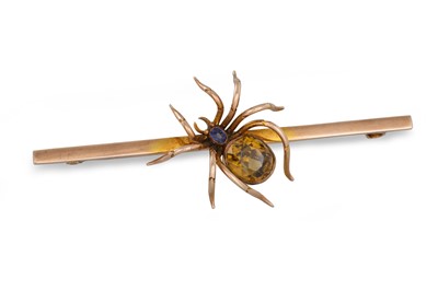 Lot 105 - A 9CT GOLD STONE SET SPIDER BAR BROOCH, 8 g.