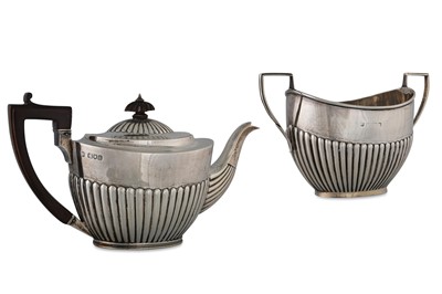 Lot 563 - A LATE VICTORIAN SILVER TWO PIECE GADROONED...