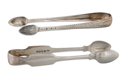 Lot 479 - A GEORGE III IRISH SILVER SUGAR TONGS, with...