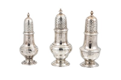 Lot 520 - TWO EARLY GEORGIAN SILVER PEPPER POTS OF URN...