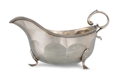 Lot 495 - A GEORGE V SILVER HELMET SHAPED SAUCE BOAT,...