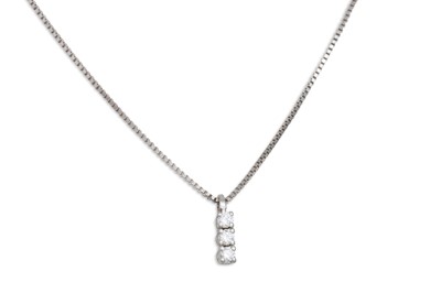Lot 162 - A THREE STONE DIAMOND DROP PENDANT, mounted in...