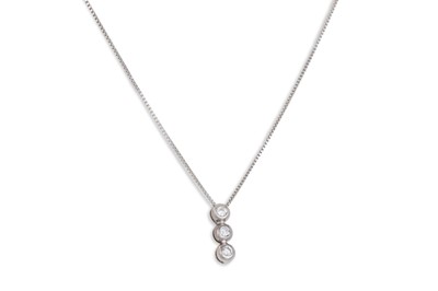 Lot 164 - A THREE STONE DIAMOND DROP PENDANT, mounted in...