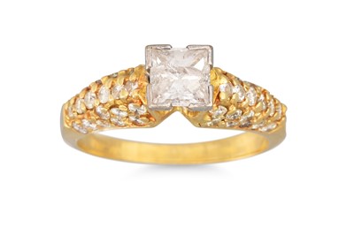 Lot 40 - A DIAMOND PRINCESS CUT DRESS RING, with...
