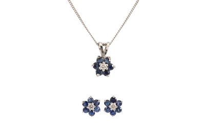 Lot 302 - A SAPPHIRE AND DIAMOND CLUSTER PENDANT, with...
