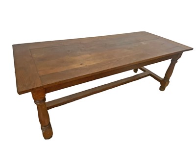 Lot 630 - A GEORGIAN OAK REFECTORY TABLE, plank top...