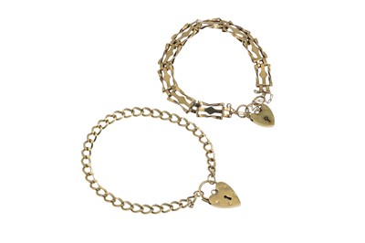 Lot 362 - TWO 9CT GOLD CURB LINK BRACELETS, 17.3 g.