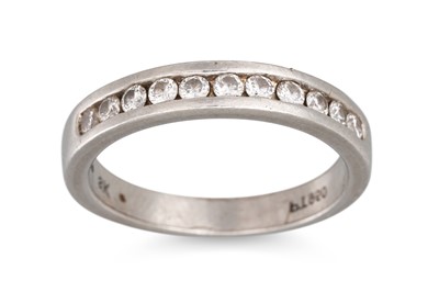 Lot 86 - A DIAMOND SET BAND RING, the eleven brilliant...