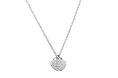 Lot 256 - A SILVER DIAMOND TIFFANY & CO. PENDANT, return...