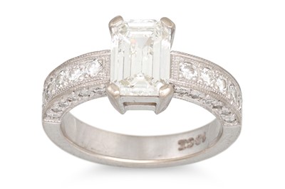 Lot 315 - A DIAMOND SOLITAIRE RING, the emerald cut...